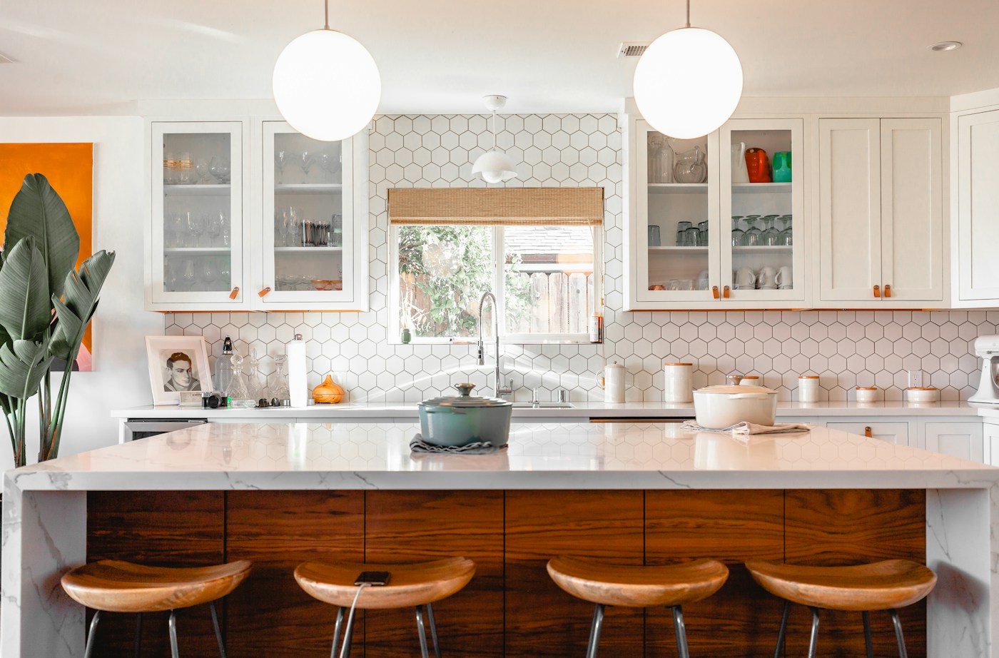 A sunlit kitchen with natural wood, reusable kitchenware and everyday objects